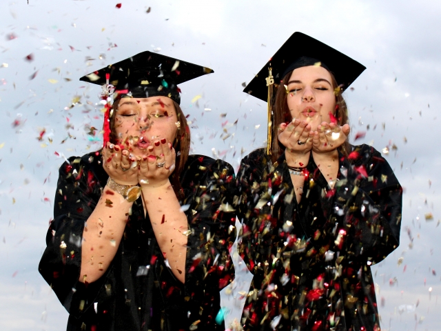 Senior girl; seniors; woman; natural light; north tx photographer; pives digital photography; outdoors; confetti; graduation; two girls; black cap and gown